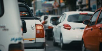 white and orange car on road during daytime